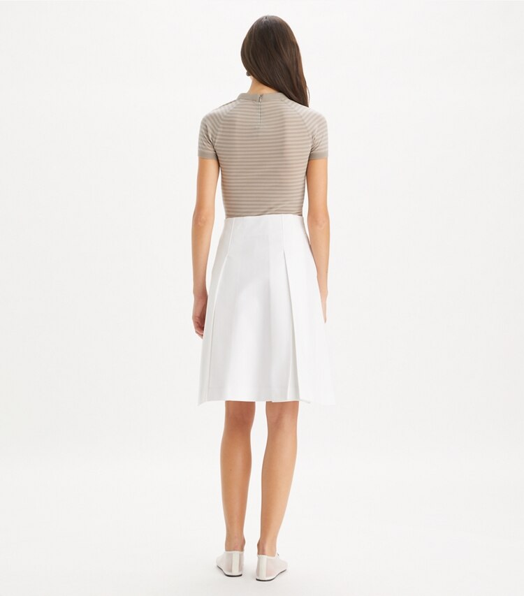 Tory Burch designer bottoms Pleated Twill Skirt in White on model back